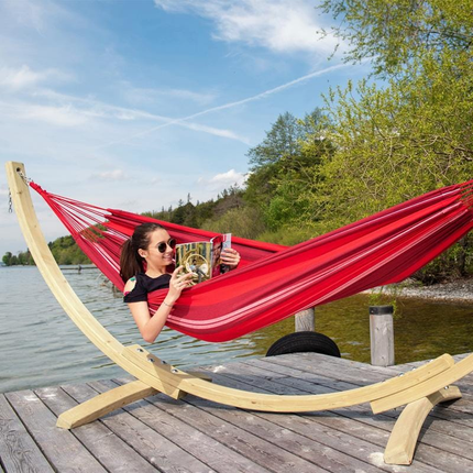 A beautiful hand-crafted, wooden framed, low hanging hammock